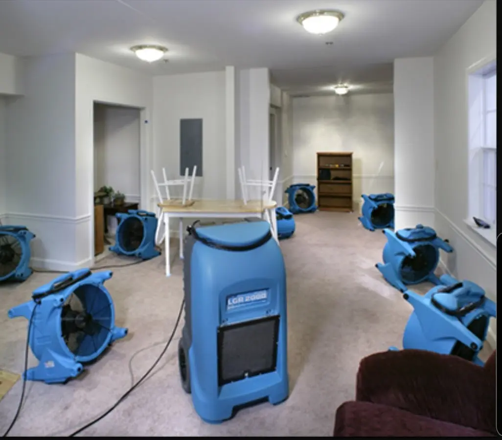 Air movers and dehumidifier setup for Water Damage Restoration in Howard